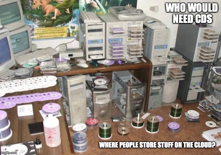 Room Full of CDs | WHO WOULD NEED CDS; WHERE PEOPLE STORE STUFF ON THE CLOUD? | image tagged in cd,memes | made w/ Imgflip meme maker