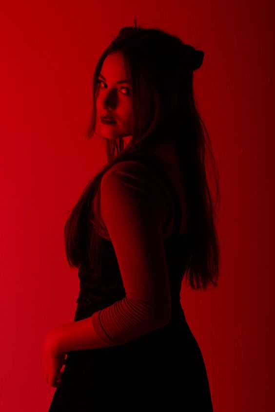 Sexy woman in red lighting Blank Meme Template