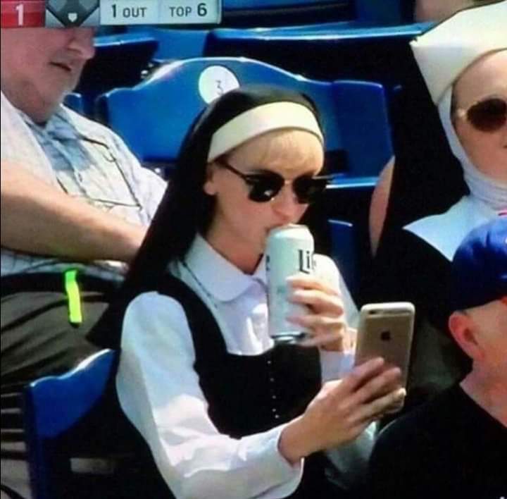 Nun drinking beer at baseball game Blank Meme Template