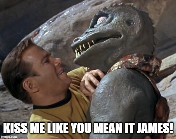 A Captain's Kiss | KISS ME LIKE YOU MEAN IT JAMES! | image tagged in captain kirk,gorn | made w/ Imgflip meme maker