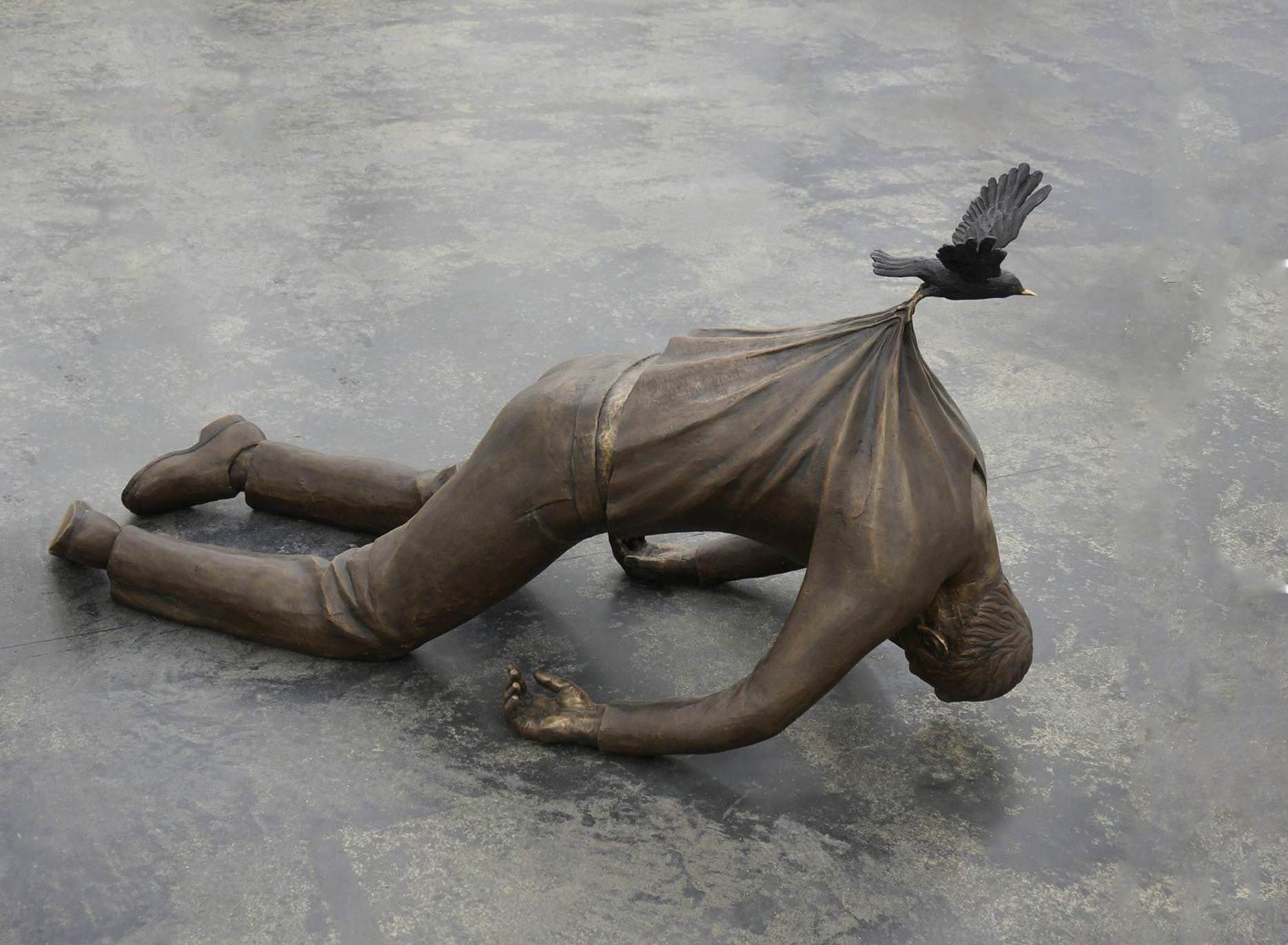 High Quality sculpture of dead man being carried by bird Blank Meme Template