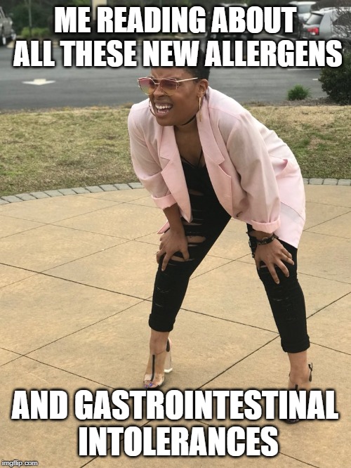 Black woman squinting | ME READING ABOUT ALL THESE NEW ALLERGENS AND GASTROINTESTINAL INTOLERANCES | image tagged in black woman squinting | made w/ Imgflip meme maker