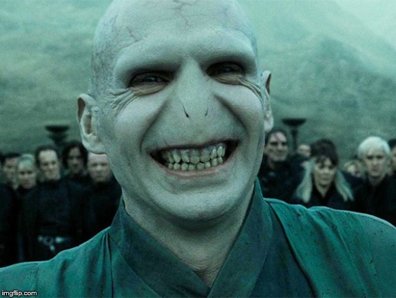 Smiling Lord Voldemort | image tagged in smiling lord voldemort | made w/ Imgflip meme maker