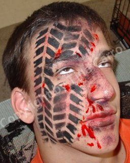 tire tracks over face