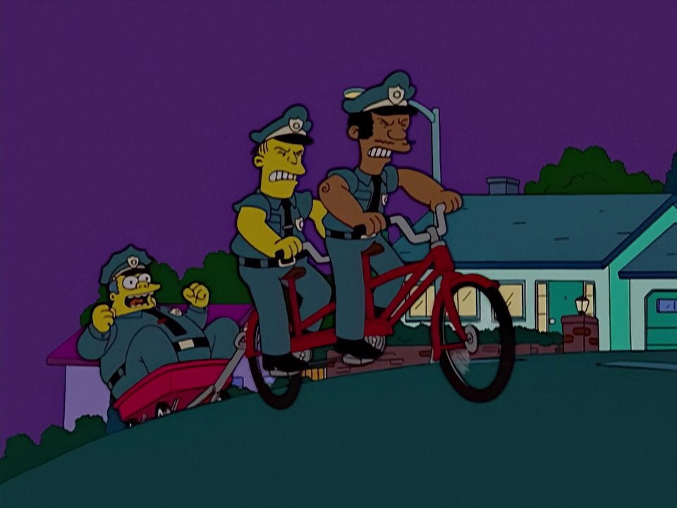 High Quality Pulling Chief Wiggum Uphill on a Bicycle Blank Meme Template