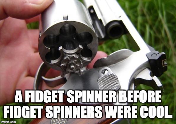 revolver | A FIDGET SPINNER BEFORE FIDGET SPINNERS WERE COOL. | image tagged in revolver | made w/ Imgflip meme maker