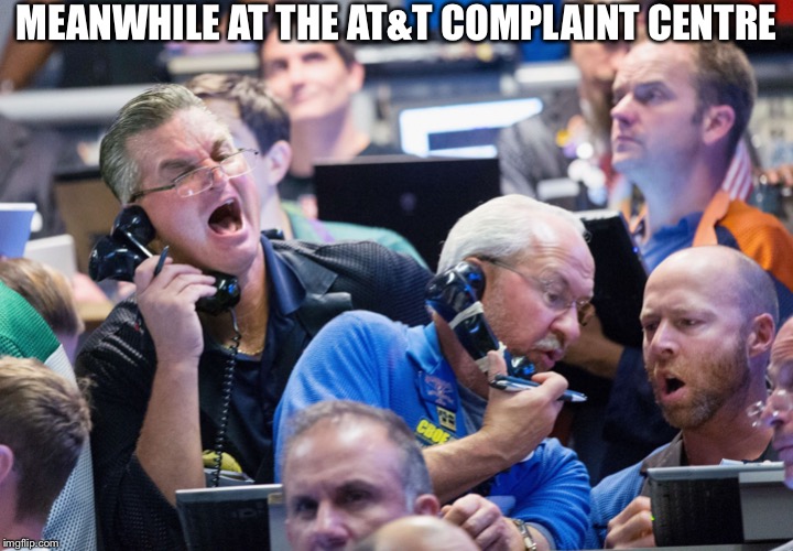 Upset Stock Market Traders | MEANWHILE AT THE AT&T COMPLAINT CENTRE | image tagged in upset stock market traders | made w/ Imgflip meme maker
