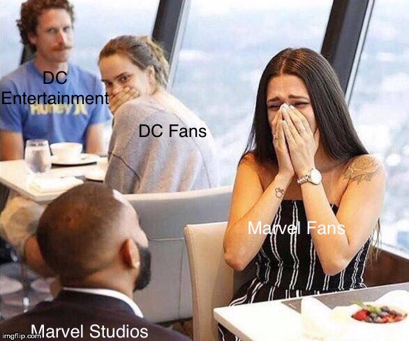 Everyone seems to love Marvel | image tagged in superheroes | made w/ Imgflip meme maker