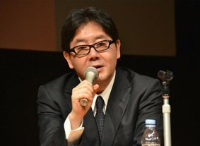 Akimoto Yasushi with mic Blank Meme Template