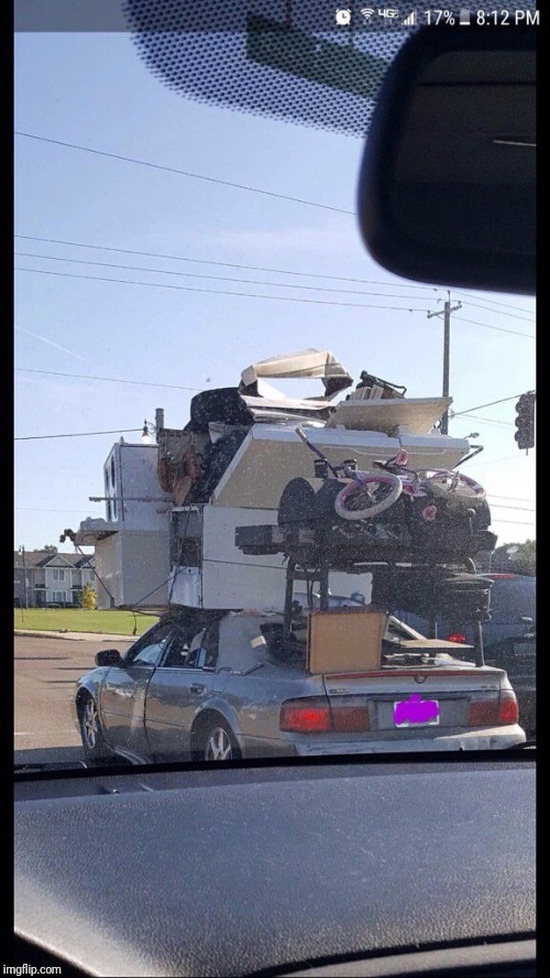 Overloaded car | image tagged in overloaded car | made w/ Imgflip meme maker