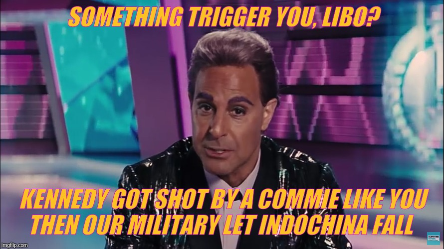 Caesar Flickerman (Stanley Tucci) | SOMETHING TRIGGER YOU, LIBO? KENNEDY GOT SHOT BY A COMMIE LIKE YOU    THEN OUR MILITARY LET INDOCHINA FALL | image tagged in caesar flickerman stanley tucci | made w/ Imgflip meme maker