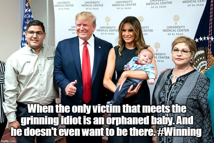 Manbaby and real baby | When the only victim that meets the grinning idiot is an orphaned baby. And he doesn't even want to be there. #Winning | image tagged in donald trump | made w/ Imgflip meme maker