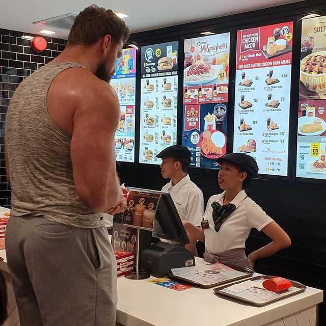 Tall man ordering at McDonald's Blank Meme Template