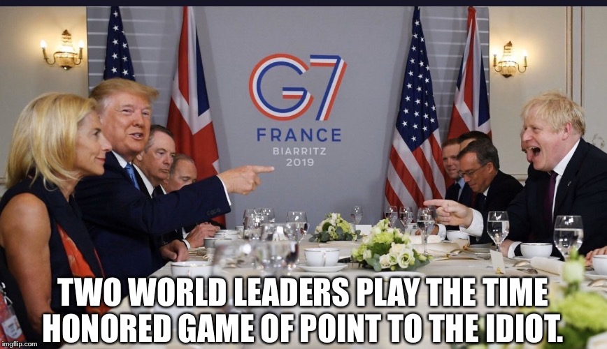 Two useless idiots | TWO WORLD LEADERS PLAY THE TIME HONORED GAME OF POINT TO THE IDIOT. | image tagged in two useless idiots | made w/ Imgflip meme maker