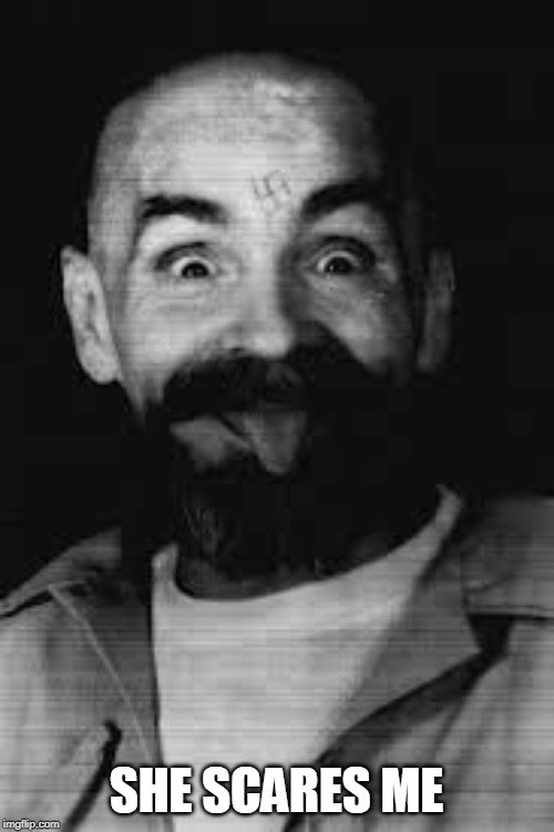 Charles Manson | SHE SCARES ME | image tagged in charles manson | made w/ Imgflip meme maker