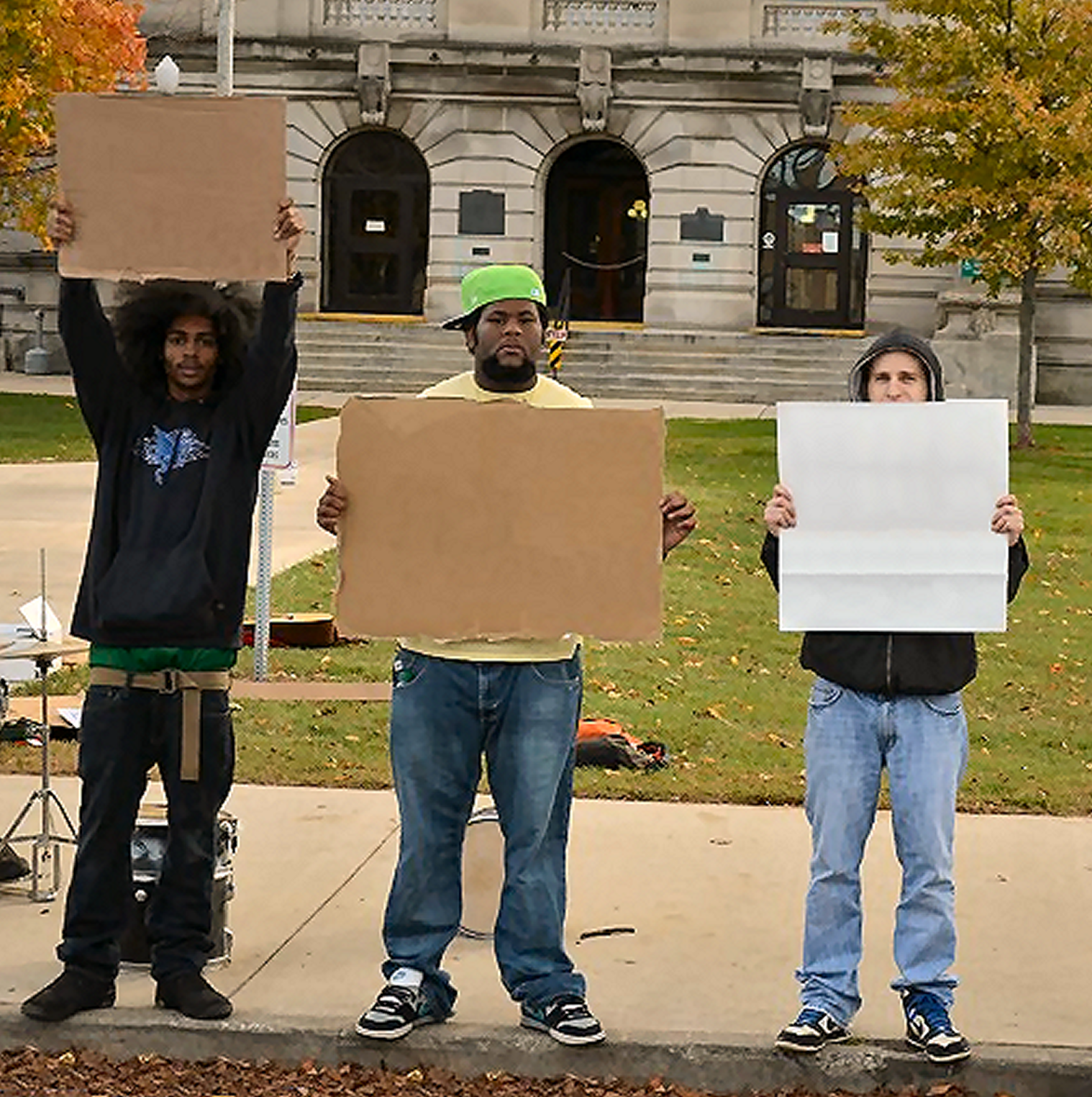 3 Demonstrators Holding Signs Blank Meme Template
