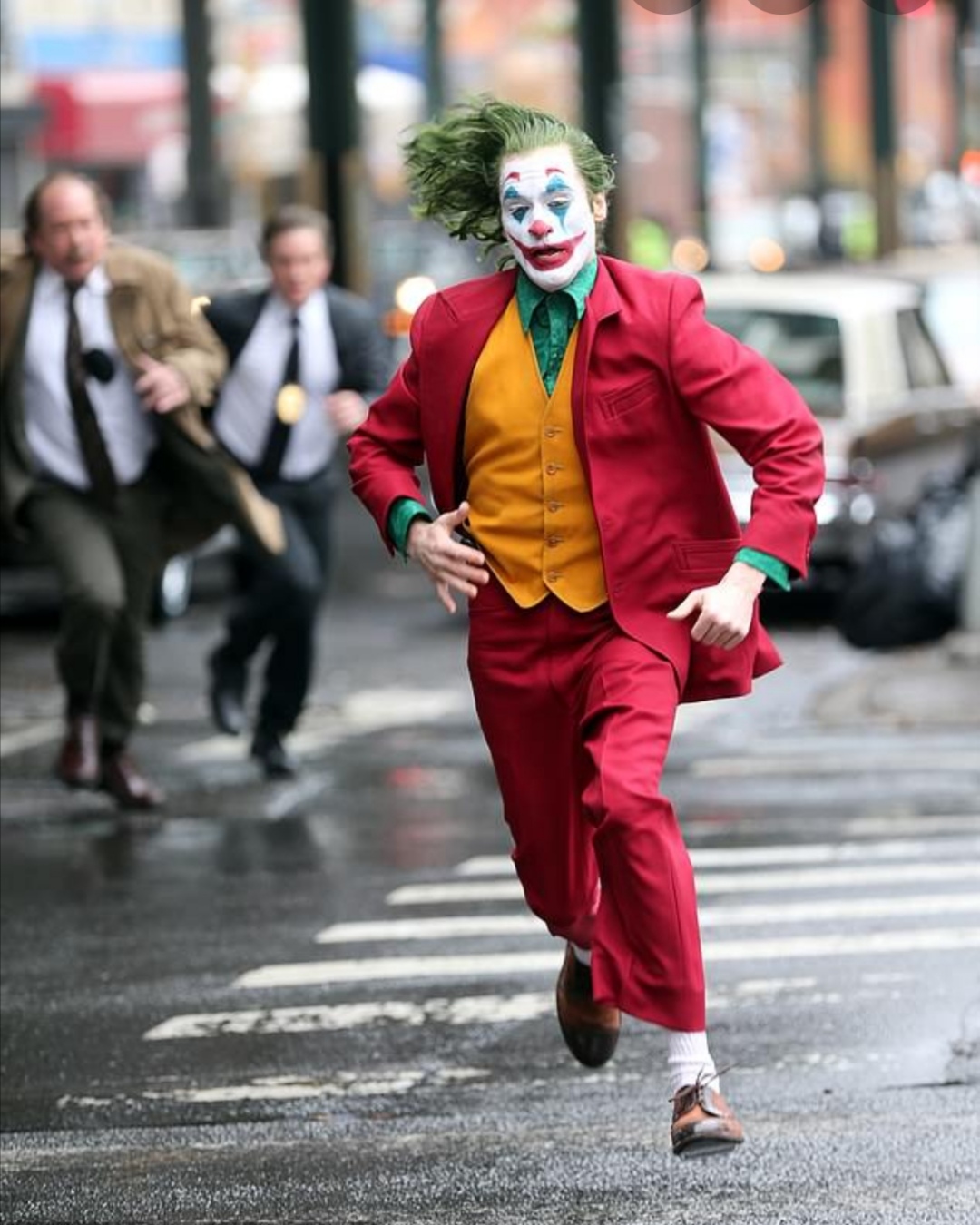 Joker running away from cops Blank Meme Template