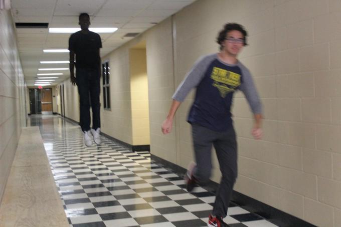 Running away from a floating black man Blank Meme Template