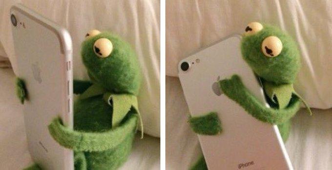 Kermit hugging his phone Blank Meme Template