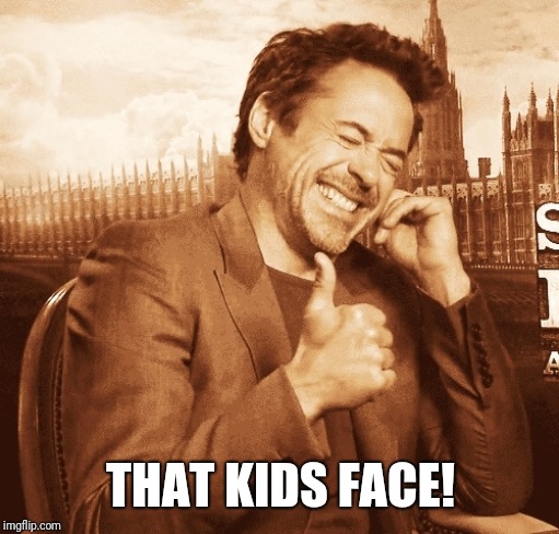 laughing | THAT KIDS FACE! | image tagged in laughing | made w/ Imgflip meme maker