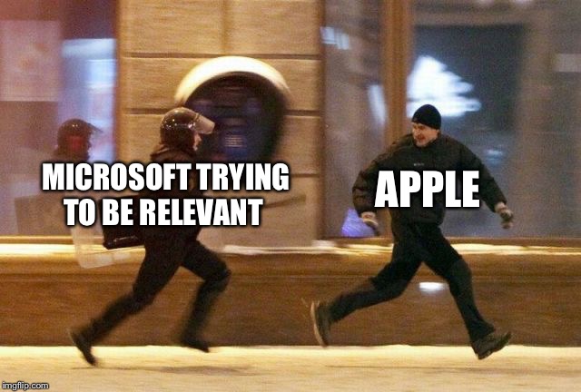 Police Chasing Guy | APPLE; MICROSOFT TRYING TO BE RELEVANT | image tagged in police chasing guy | made w/ Imgflip meme maker