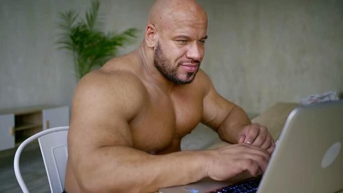 Buff guy on laptop 2 Blank Meme Template