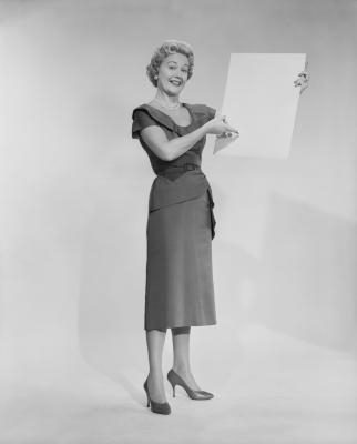 Vintage woman holding blank sign Blank Meme Template