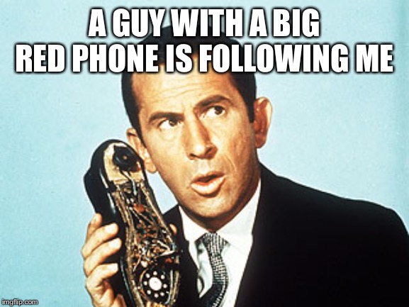 Get Smart | A GUY WITH A BIG RED PHONE IS FOLLOWING ME | image tagged in get smart | made w/ Imgflip meme maker