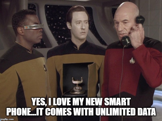 Captain Loves His Phone | YES, I LOVE MY NEW SMART PHONE...IT COMES WITH UNLIMITED DATA | image tagged in captain picard,star trek data | made w/ Imgflip meme maker