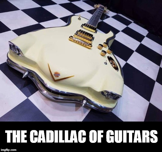 kool | THE CADILLAC OF GUITARS | image tagged in cadilac,guitars | made w/ Imgflip meme maker