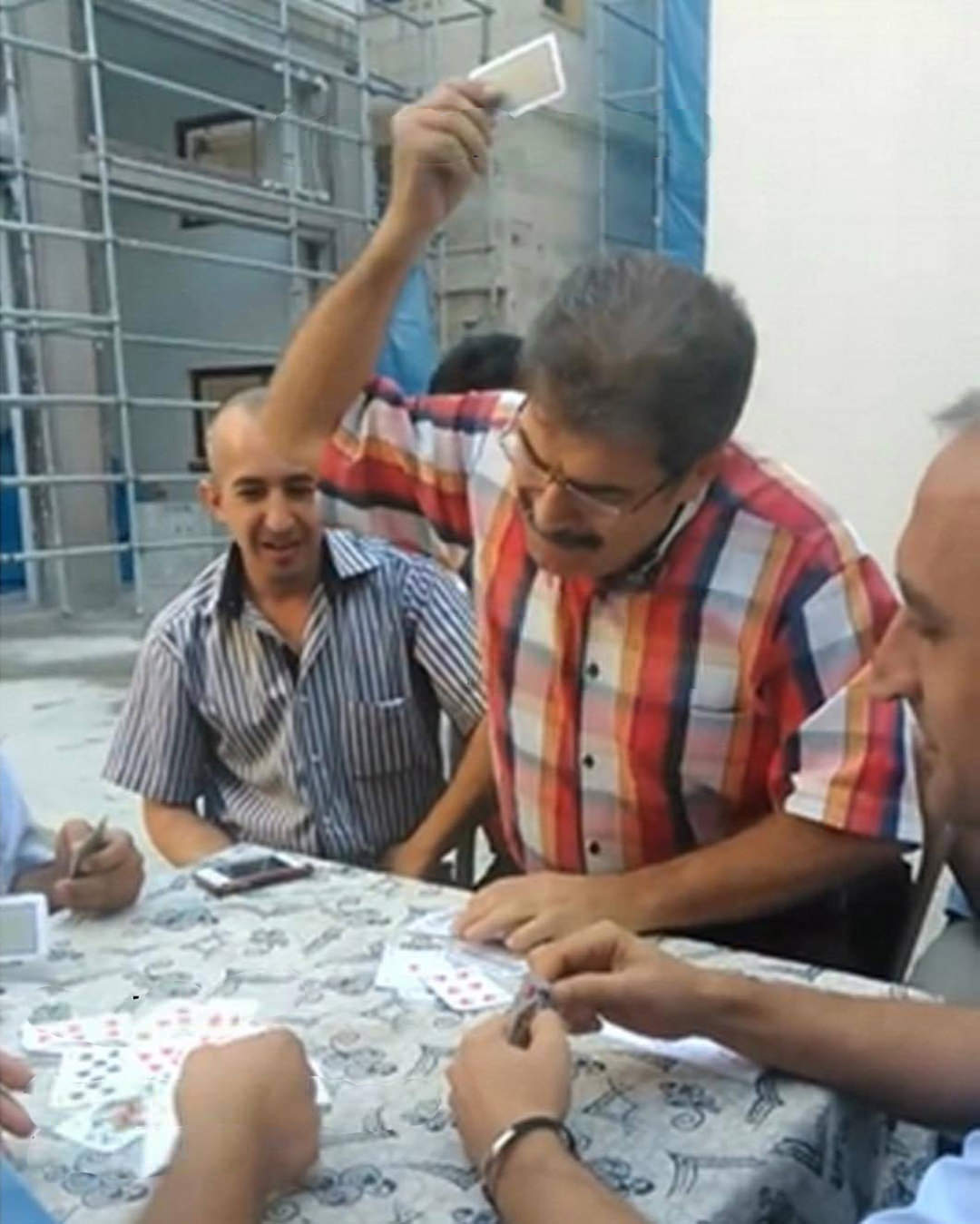 Angry turkish man playing cards Blank Meme Template