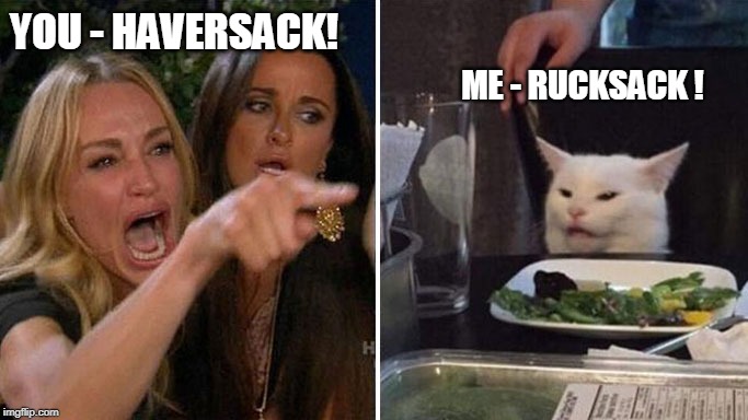 Angry lady cat | ME - RUCKSACK ! YOU - HAVERSACK! | image tagged in angry lady cat | made w/ Imgflip meme maker