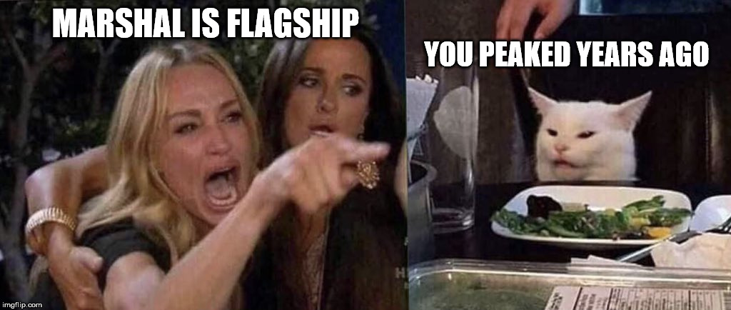 woman yelling at cat | MARSHAL IS FLAGSHIP; YOU PEAKED YEARS AGO | image tagged in woman yelling at cat | made w/ Imgflip meme maker