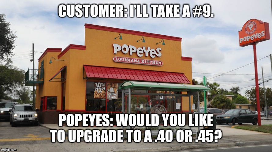 A Popeyes Upgrade | CUSTOMER: I’LL TAKE A #9. POPEYES: WOULD YOU LIKE TO UPGRADE TO A .40 OR .45? | image tagged in popeyes,fast food,restaurant,hugs | made w/ Imgflip meme maker