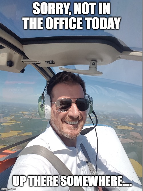 SORRY, NOT IN THE OFFICE TODAY; UP THERE SOMEWHERE.... | image tagged in pilot,working,office | made w/ Imgflip meme maker