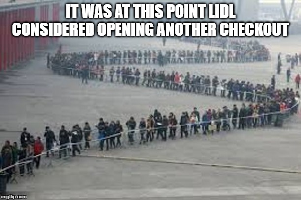 Very long line in plaza 600 x 400 | IT WAS AT THIS POINT LIDL CONSIDERED OPENING ANOTHER CHECKOUT | image tagged in very long line in plaza 600 x 400 | made w/ Imgflip meme maker