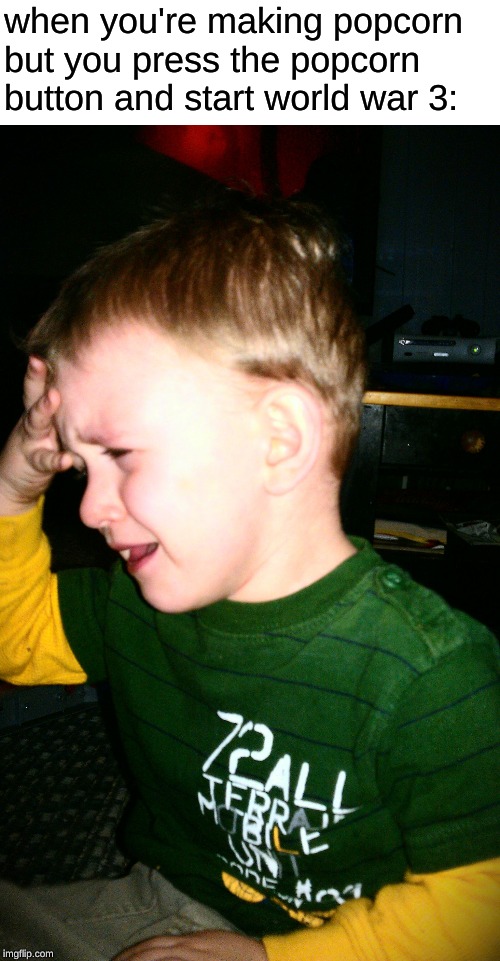 kid facepalm | when you're making popcorn but you press the popcorn button and start world war 3: | image tagged in kid facepalm | made w/ Imgflip meme maker