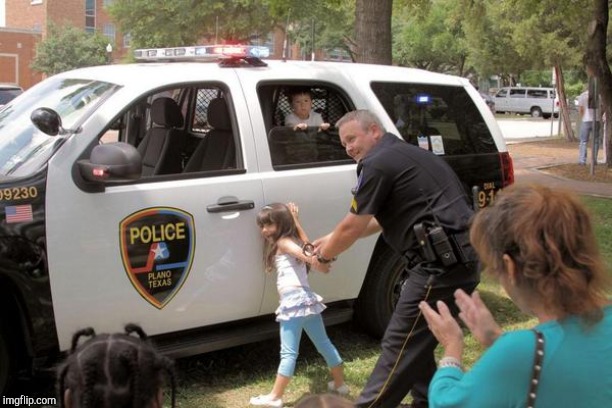 Cops arrest little girl, Fuck the police! | image tagged in cops arrest little girl fuck the police | made w/ Imgflip meme maker