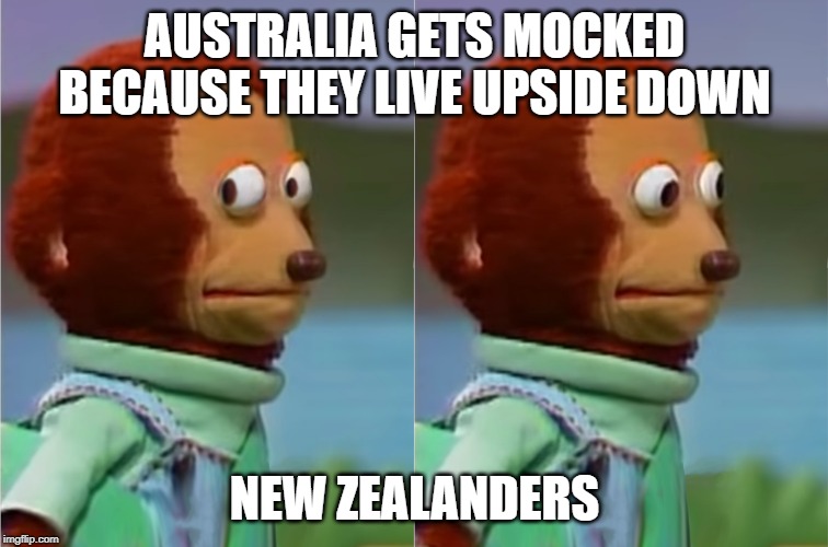 Looking Away | AUSTRALIA GETS MOCKED BECAUSE THEY LIVE UPSIDE DOWN; NEW ZEALANDERS | image tagged in looking away | made w/ Imgflip meme maker