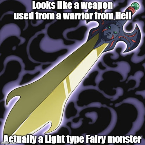 Misleading monster type and attribute 3 | Looks like a weapon used from a warrior from Hell; Actually a Light type Fairy monster | image tagged in yugioh | made w/ Imgflip meme maker