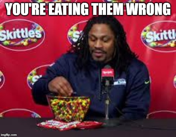 Marshawn skittles | YOU'RE EATING THEM WRONG | image tagged in marshawn skittles | made w/ Imgflip meme maker