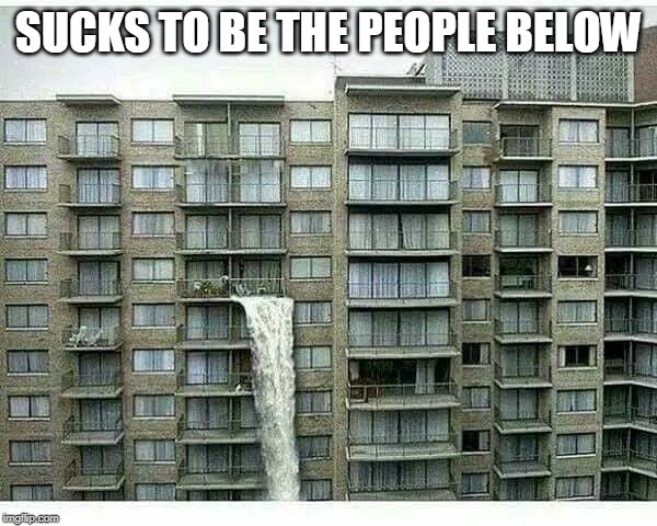 SUCKS TO BE THE PEOPLE BELOW | image tagged in flooding | made w/ Imgflip meme maker