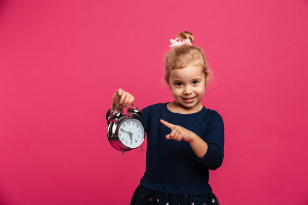 High Quality happy little girl with alarm clock Blank Meme Template