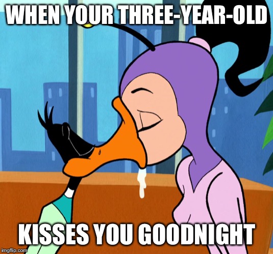 Three-Year-Old Kisses | WHEN YOUR THREE-YEAR-OLD; KISSES YOU GOODNIGHT | image tagged in kissing,kids,daffy duck | made w/ Imgflip meme maker