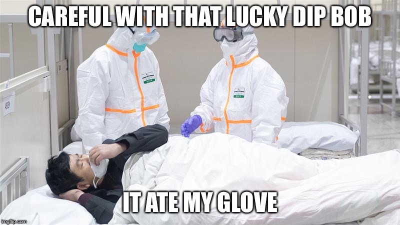 Virus troubles? | CAREFUL WITH THAT LUCKY DIP BOB; IT ATE MY GLOVE | image tagged in guy has more to worry about than the virus | made w/ Imgflip meme maker