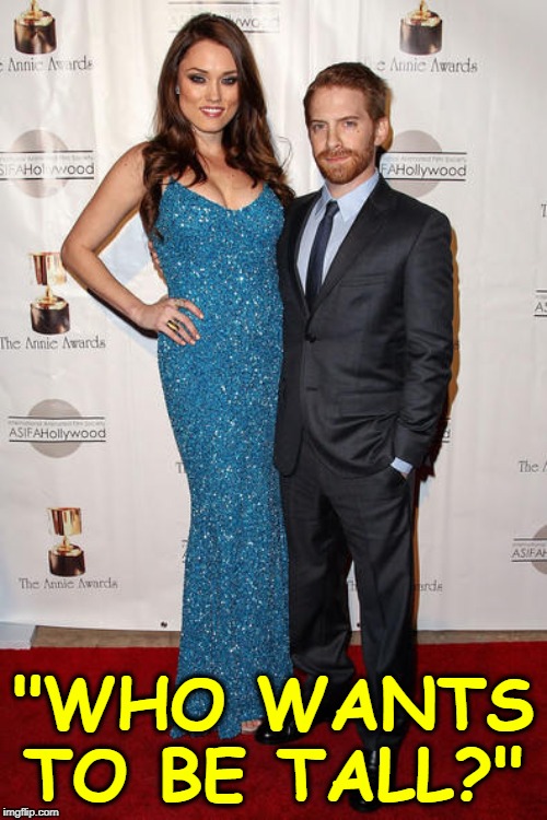 Clare Grant and Seth Green | "WHO WANTS TO BE TALL?" | image tagged in tall,girl,short,guy | made w/ Imgflip meme maker