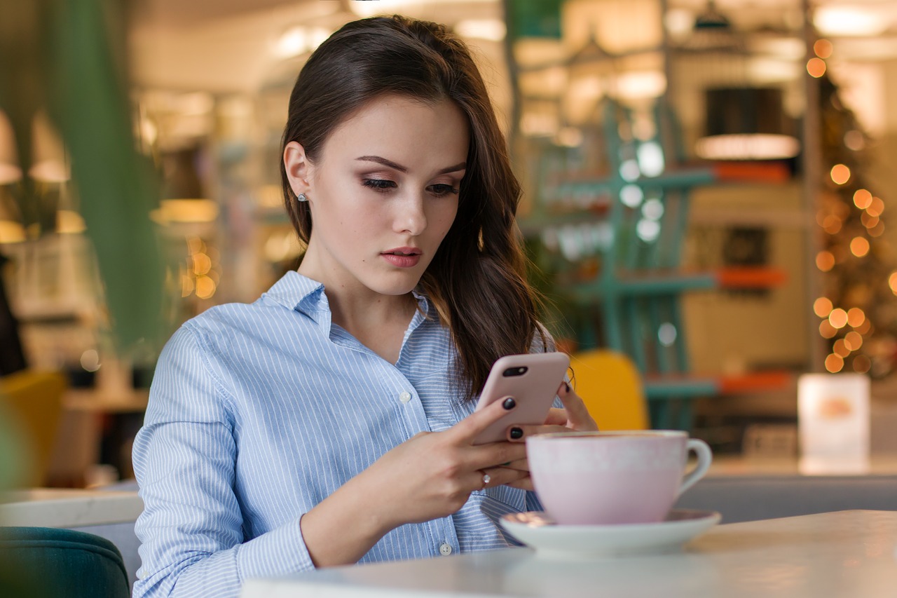 Woman on phone but not looking happy Blank Meme Template