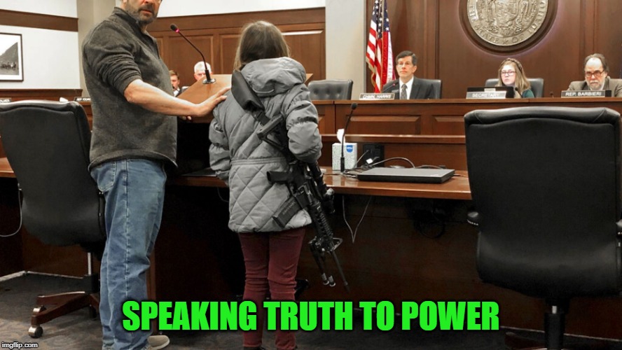 An 11-year-old girl appeared at a gun legislation hearing in Idaho’s capital Monday wearing a loaded AR-15 rifle slung over her. | SPEAKING TRUTH TO POWER | image tagged in american politics | made w/ Imgflip meme maker