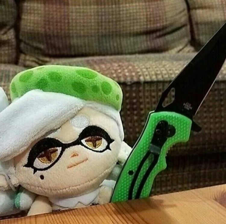 Marie plush with a knife Blank Meme Template
