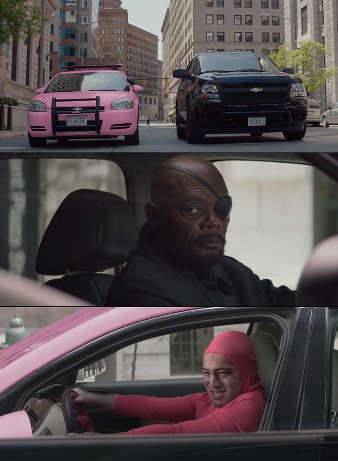 gay pesron in pink car looking at nick fury in serious car Blank Meme Template